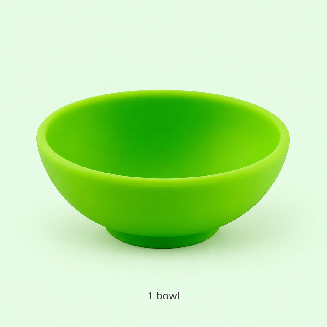One empty lime-green silicone bowl; single-piece contents.