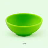 One empty lime-green silicone bowl; single-piece contents.