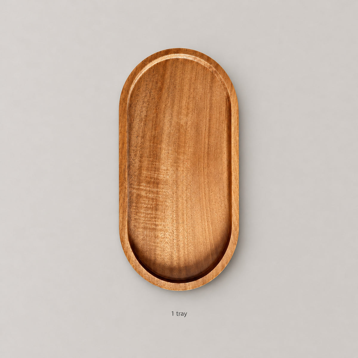 One small oval solid wood tray; no serving accessories included.