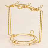 Gold twisted-wire rack showing curved cup hooks and circular saucer-support rings.