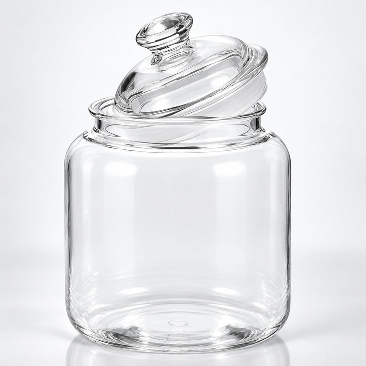 Clear glass jar with a matching glass lid, photographed on a clean white studio background.