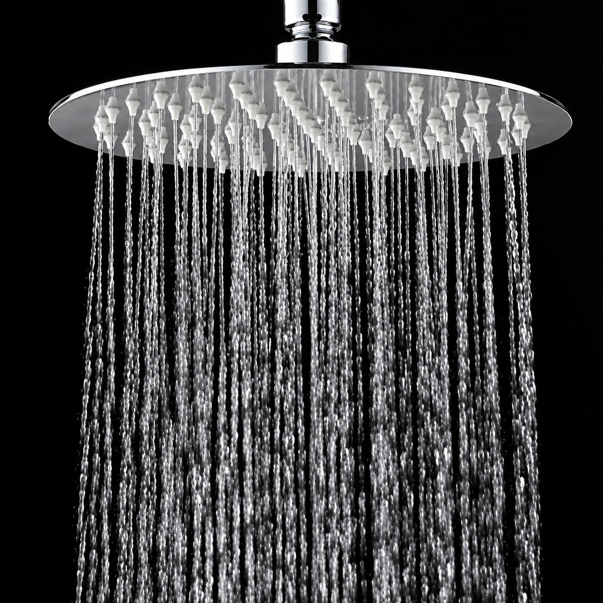 A round chrome rain shower head with water cascading down against a solid black background.