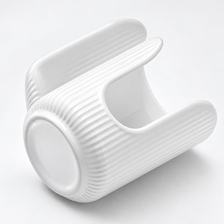 A white ribbed ceramic cup with a built-in lid, shown on a clean white background.