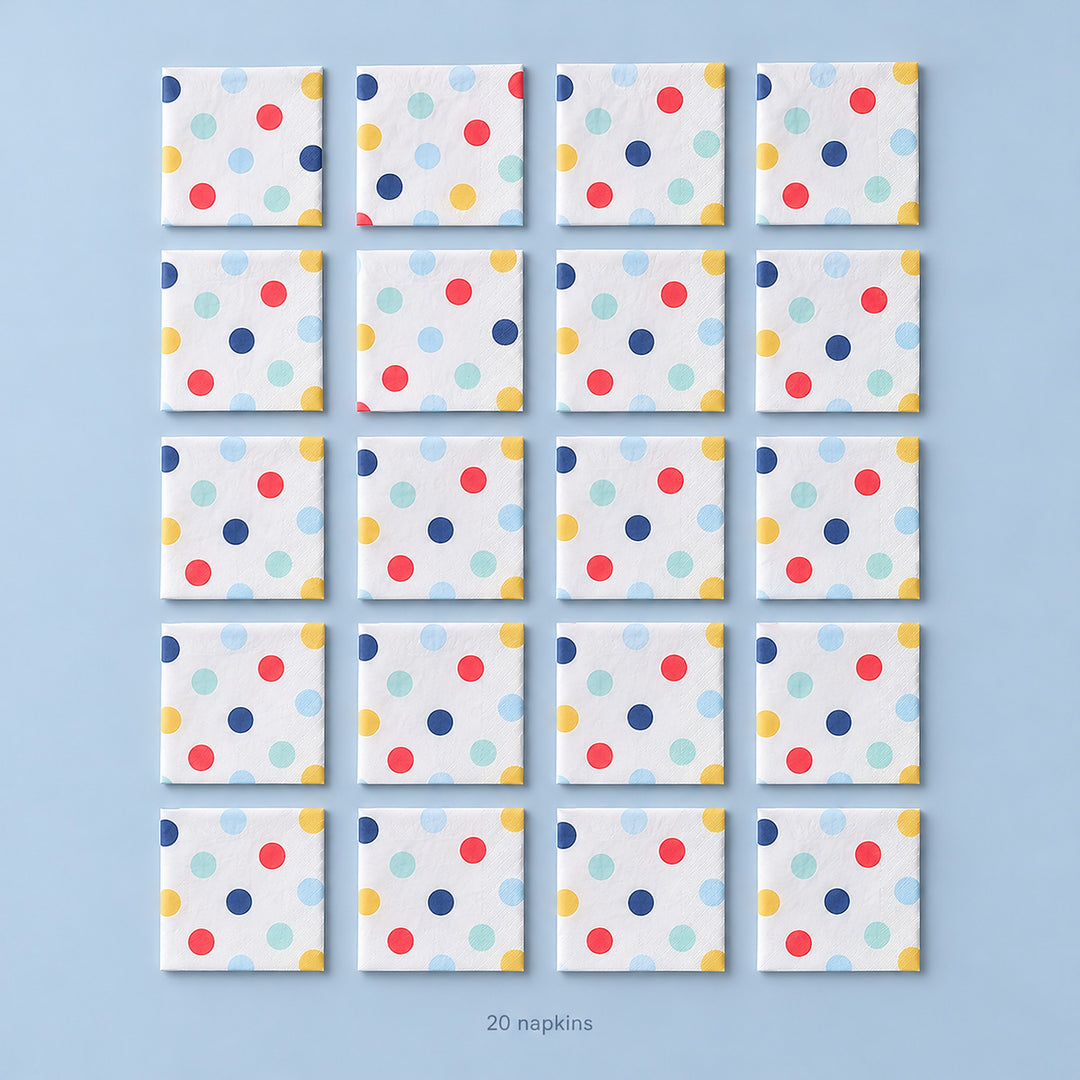 Twenty folded large-dot paper napkins, arranged four by five.