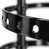 Black metal earring ring with round hanging holes.