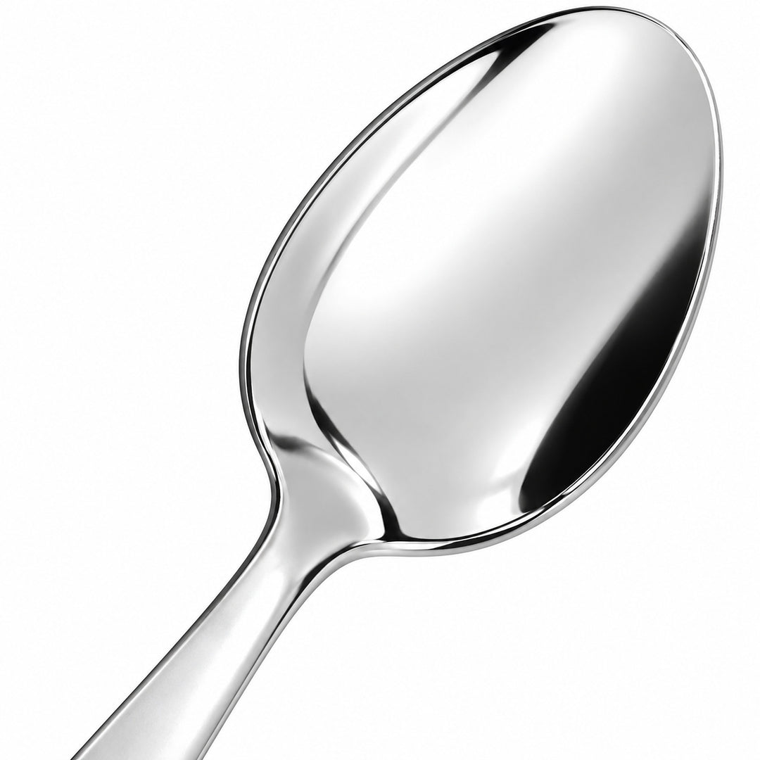 Close-up of the teaspoon polished bowl rim and metal neck.