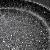 Macro of the fine speckled Maifan coating and low pan rim.