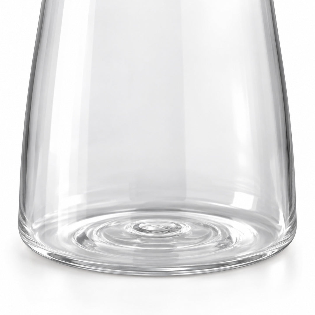 Clear molded plastic wall and rounded carafe base detail.