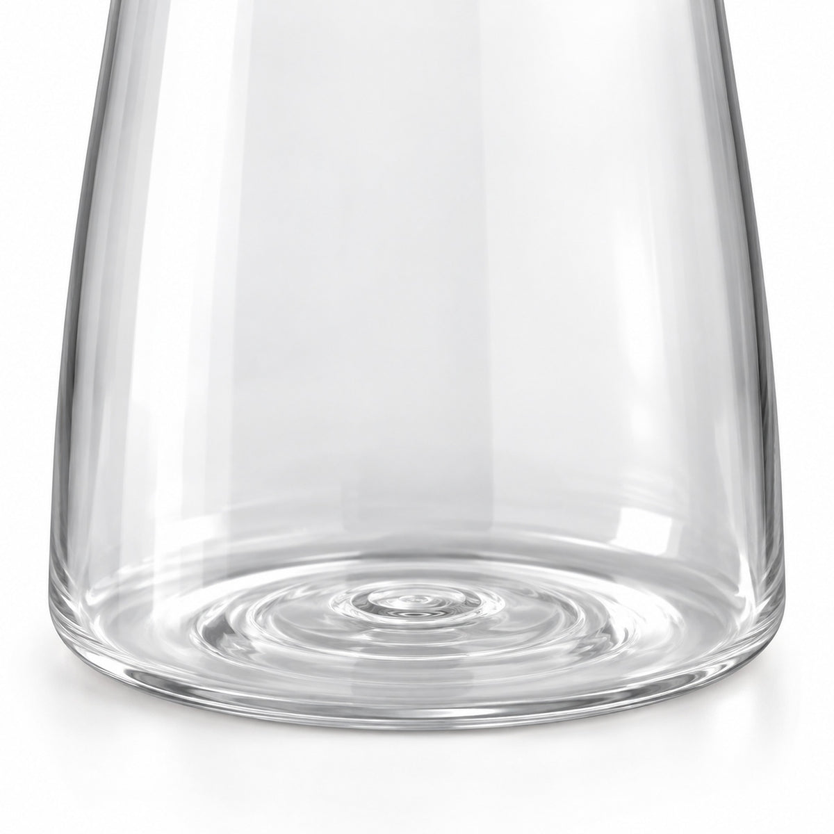 Clear molded plastic wall and rounded carafe base detail.