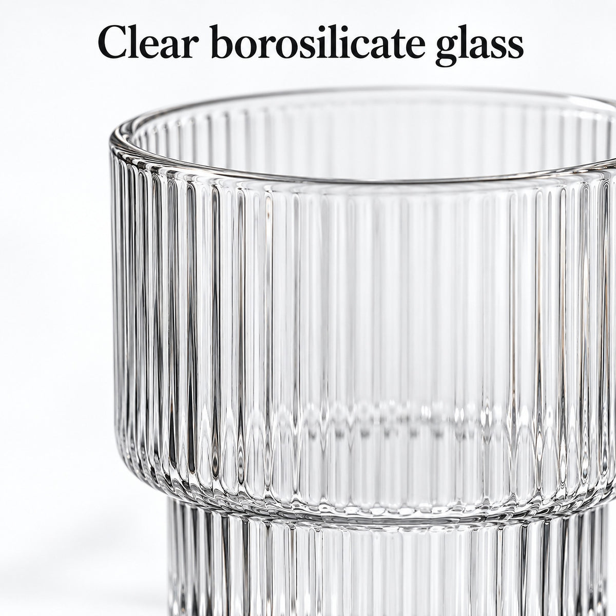 Close-up of clear borosilicate glass ribs, rim and stepped base.