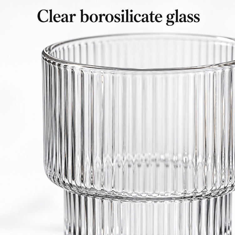 Close-up of clear borosilicate glass ribs, rim and stepped base.