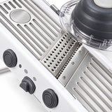 Stainless-steel slicing deck, blade and julienne section detail.
