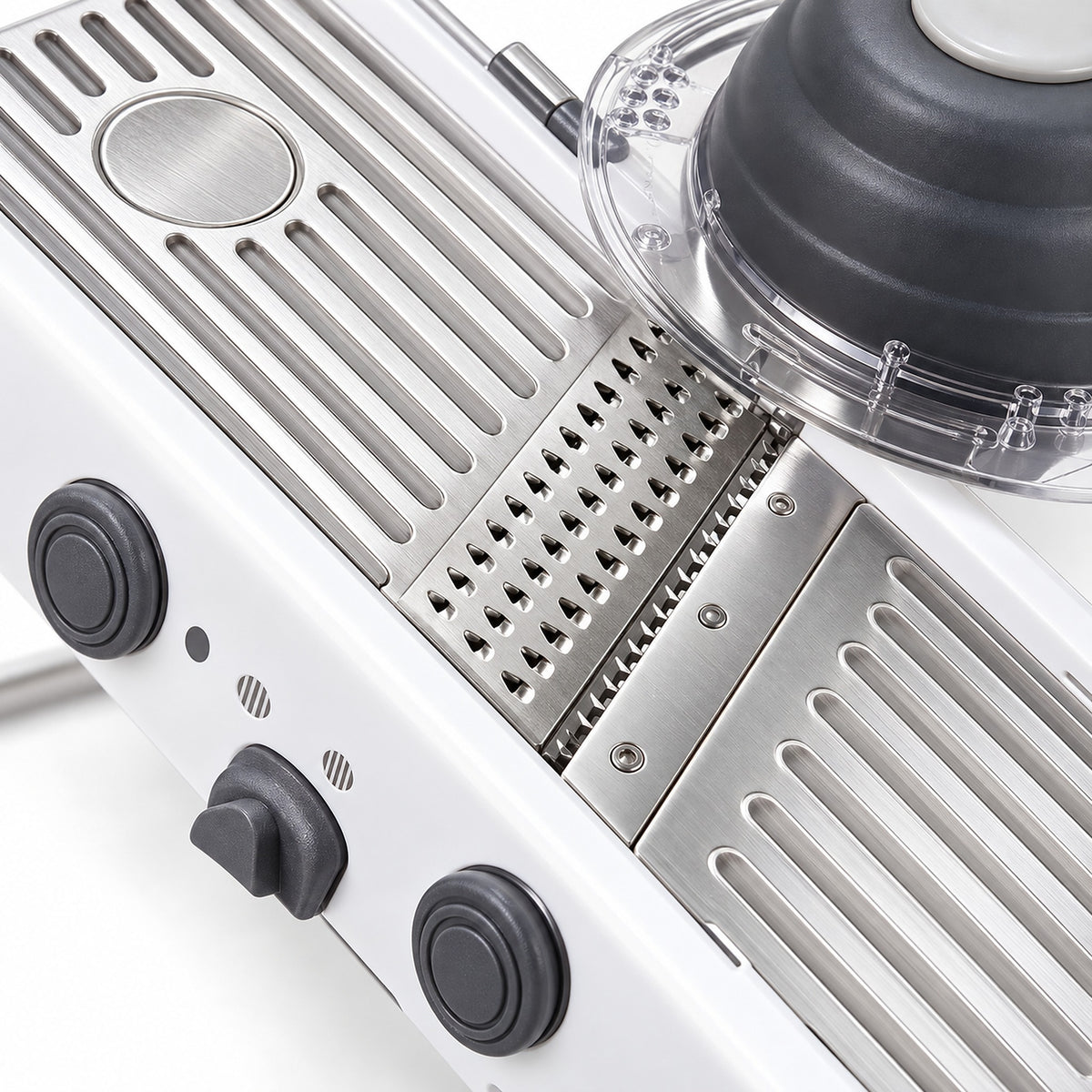 Stainless-steel slicing deck, blade and julienne section detail.