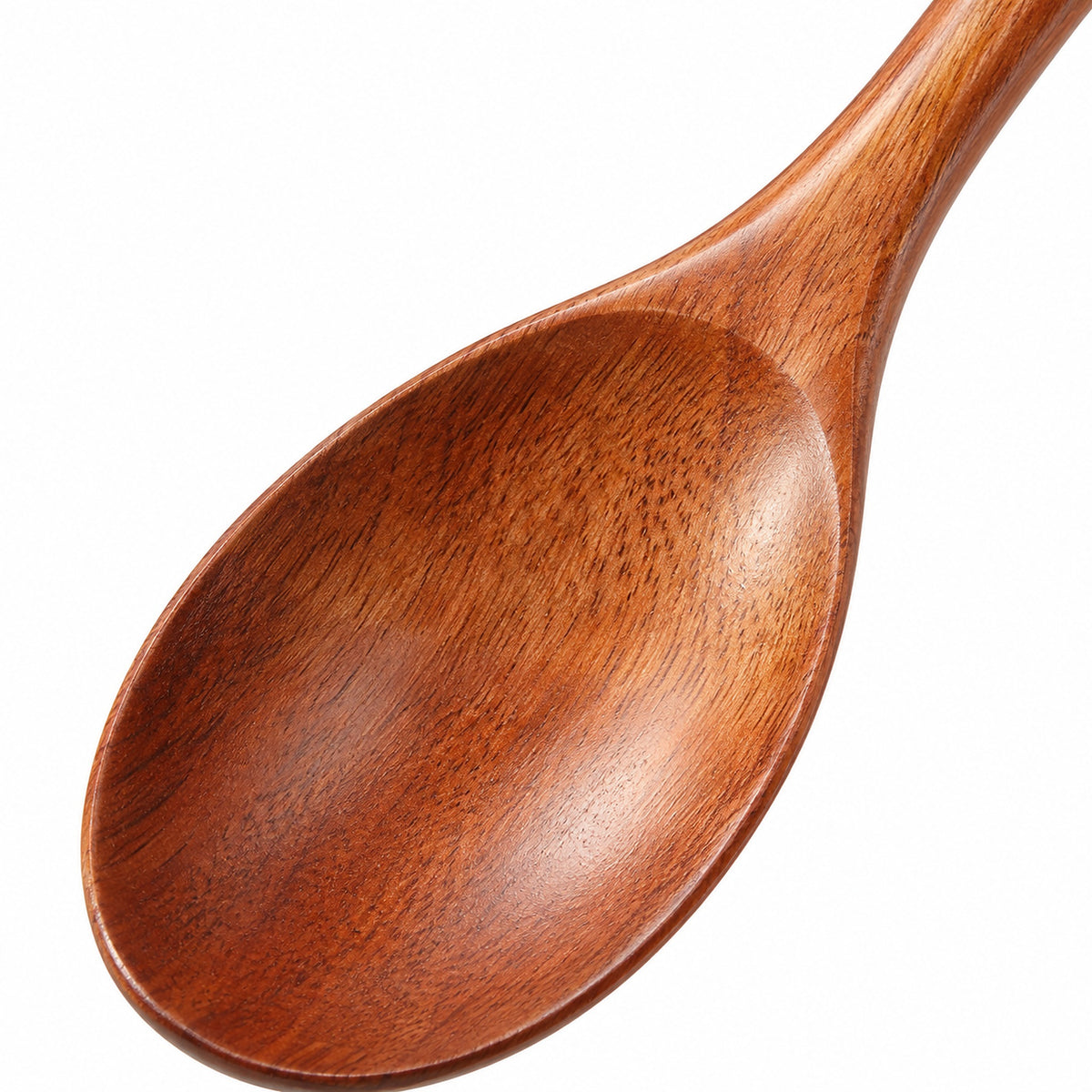 Macro of the Brown spoon fine wood grain and smooth bowl rim.