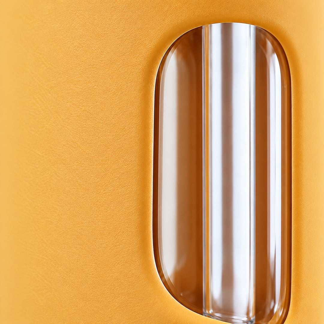 Close-up of the yellow silicone sleeve and transparent glass window.