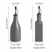Two gray bottle-shaped oil or vinegar dispensers shown on a white background with dimension arrows and text indicating height, width, and 300 ml capacity.