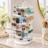 White five-tier round-base stand organizing earrings on a dresser.