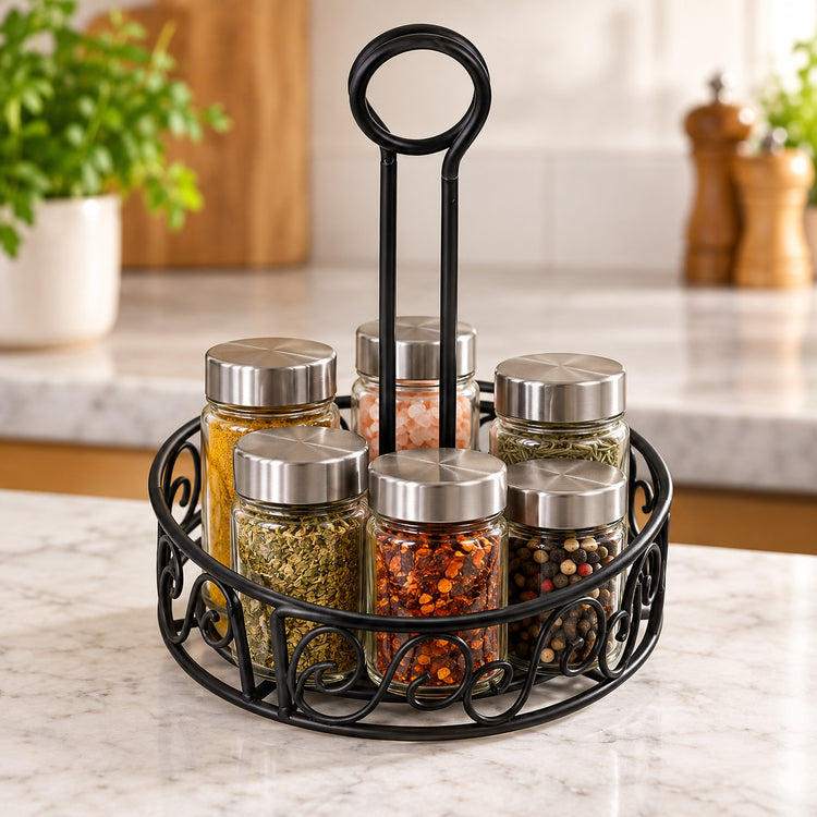 A black metal spice rack with six glass jars filled with various spices, set on a marble kitchen countertop.