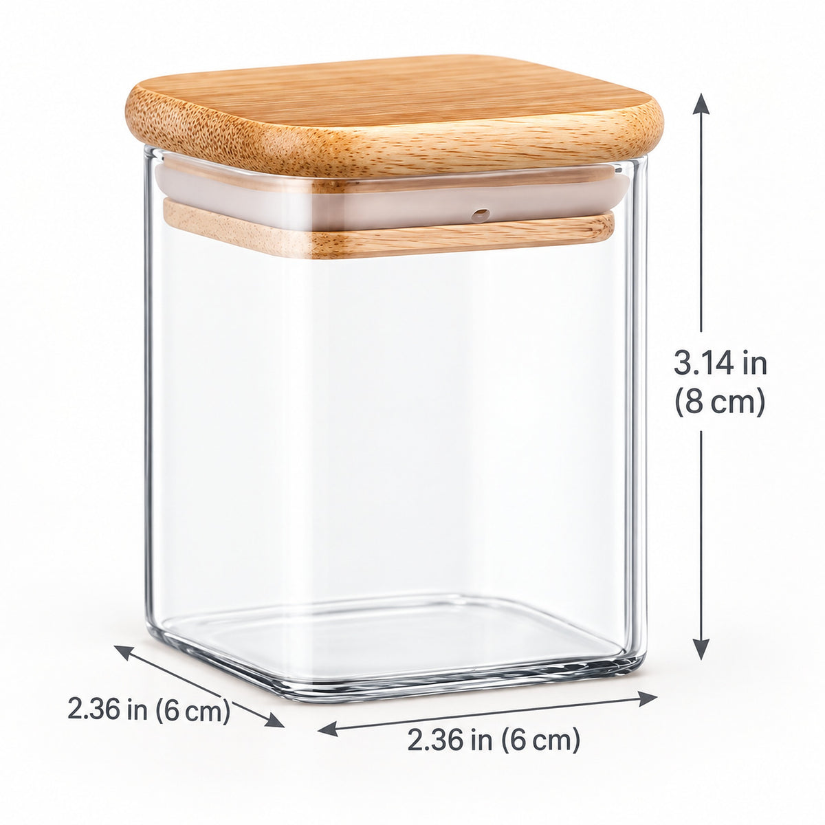 Clear glass storage jar with a light wood lid, shown with dimension arrows and labels indicating height of 3.14 in (8 cm) and base dimensions of 2.