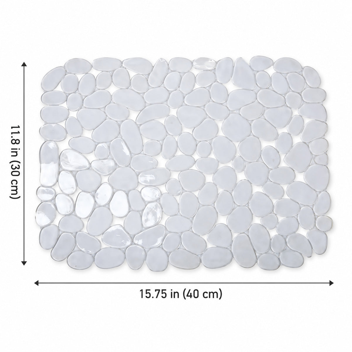 A rectangular pebble mosaic bath mat made of smooth, rounded glossy white stones, shown with dimension arrows and labels indicating 11.8 in (30 cm) by 15.
