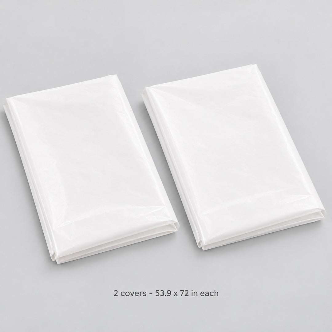Two folded white covers, each 137 x 183 cm.