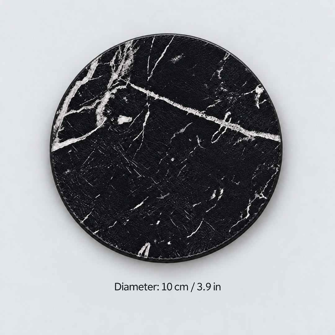Black marble-print coaster with a 10 cm / 3.9 in diameter label.