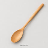 One Camel wood spoon, approximately 23.5 cm long.