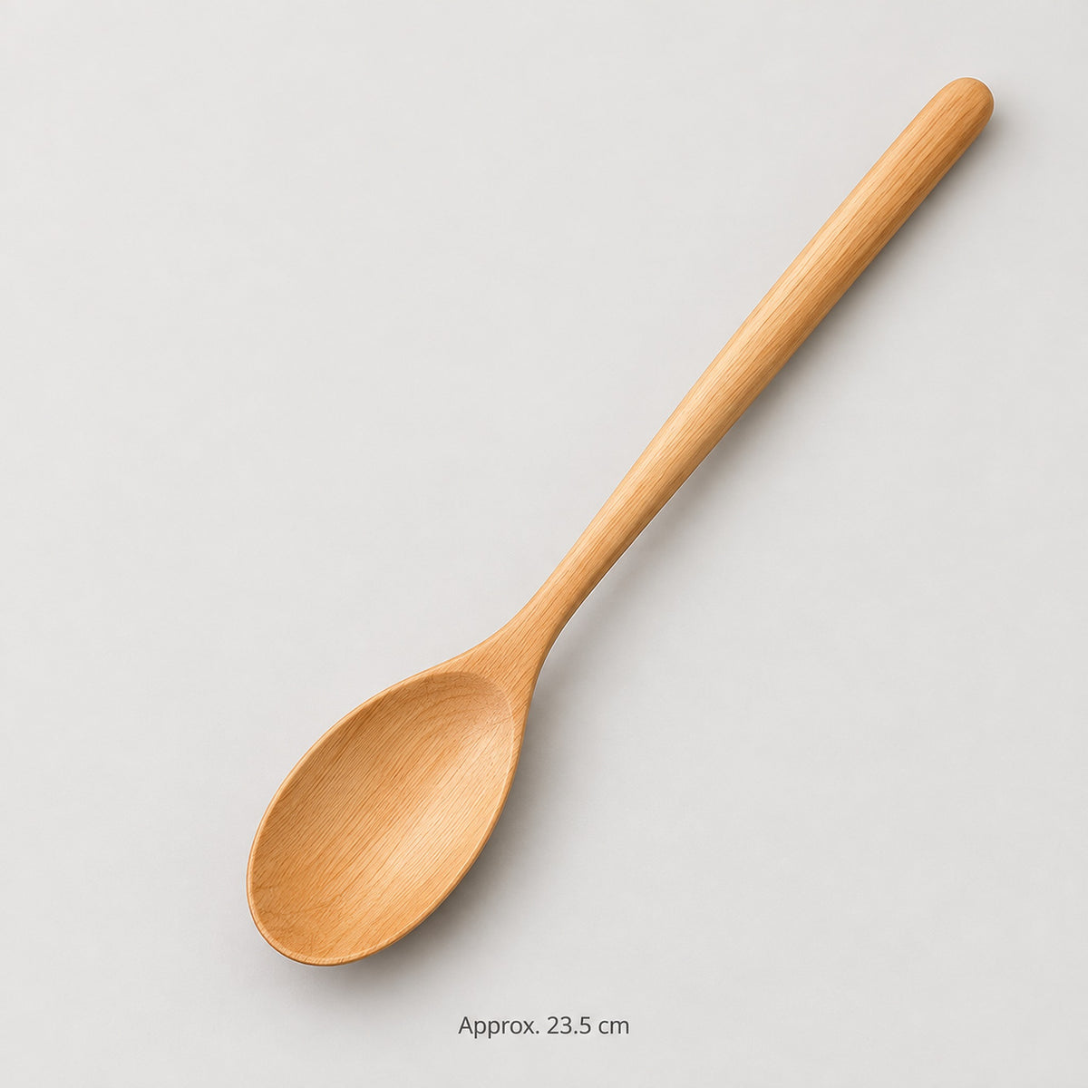 One Camel wood spoon, approximately 23.5 cm long.
