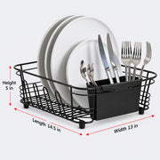 Black wire dish drying rack with a built-in utensil holder, shown holding white plates and silver cutlery on a light gray background, with red dimension arrows and text indicating height 5 in, length 14.5 in, and width 13 in.