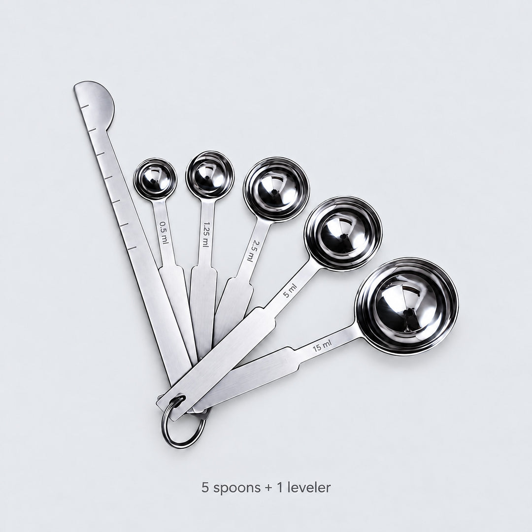 Spoon set contents: five measuring spoons, one flat leveler and a joining ring.