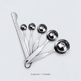 Spoon set contents: five measuring spoons, one flat leveler and a joining ring.