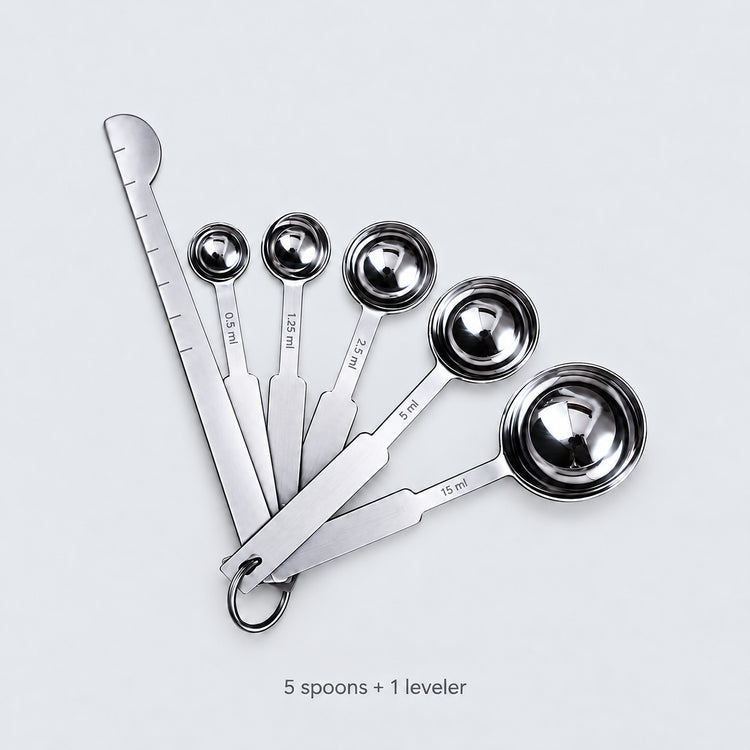 Spoon set contents: five measuring spoons, one flat leveler and a joining ring.