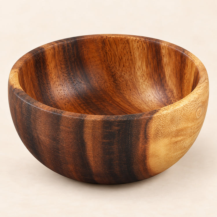 Acacia bowl with contrasting natural grain, thick rim and smooth interior.