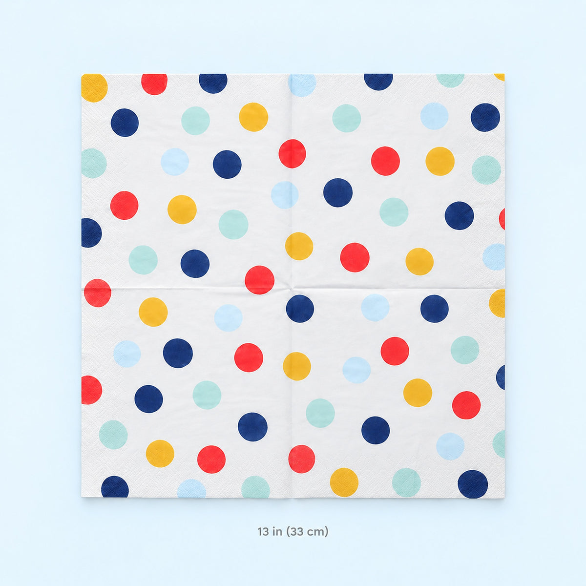 Unfolded square paper napkin measuring approximately 33 cm.