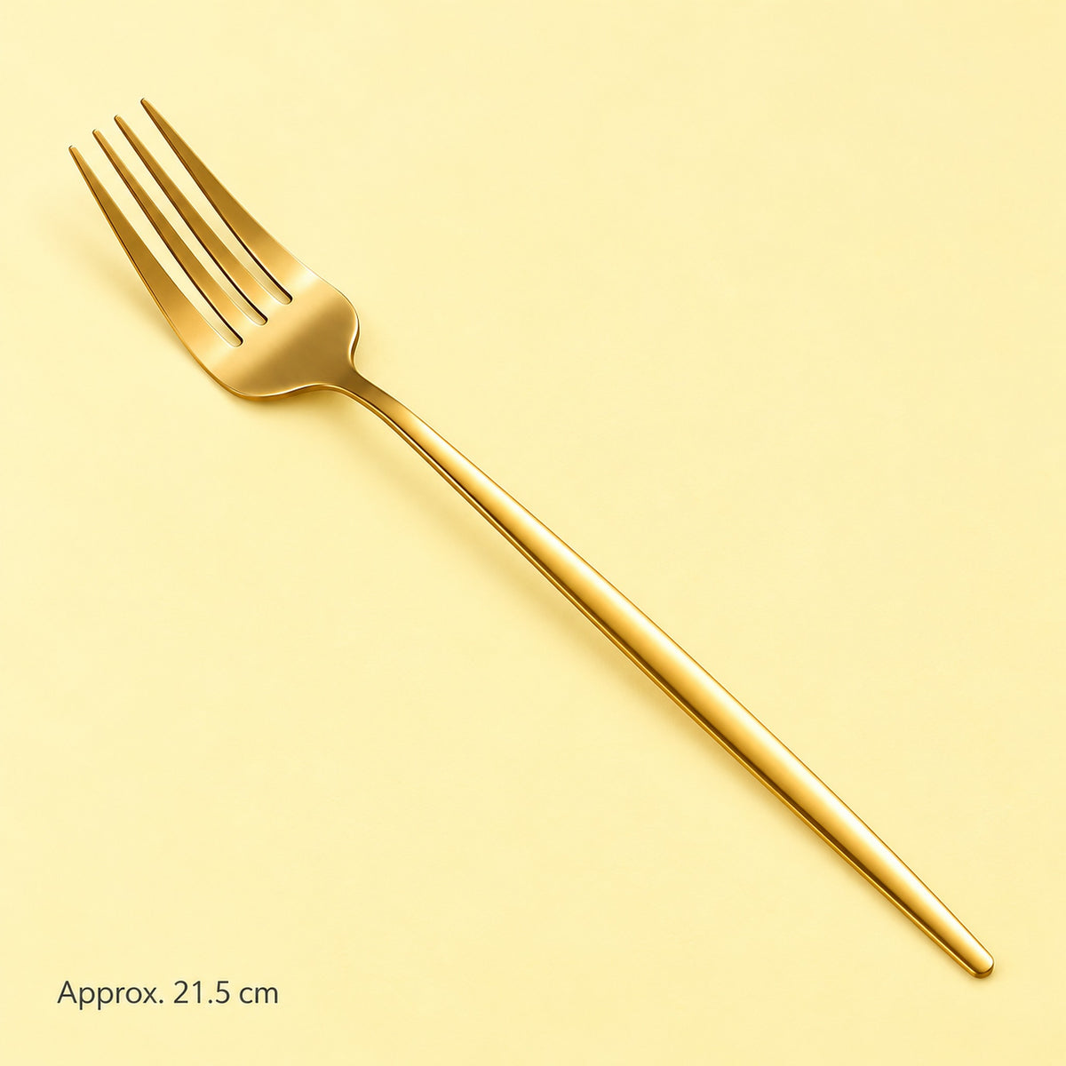One gold dinner fork, approximately 21.5 cm long.