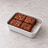 Shallow mini baking pan used for a small batch of brownies.
