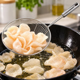 Wire skimmer lifting fried crackers from a pan.