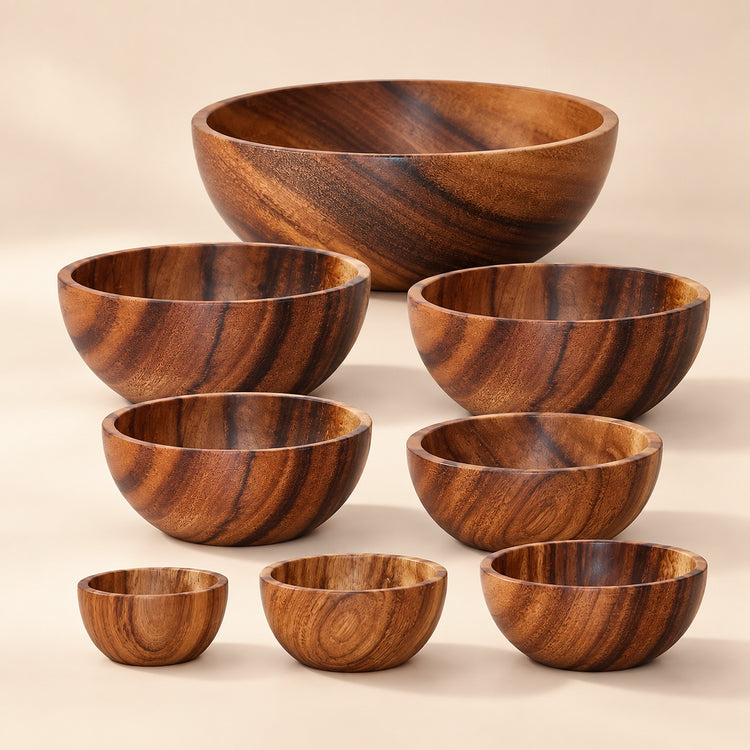 Acacia wood bowl size range arranged from small to large