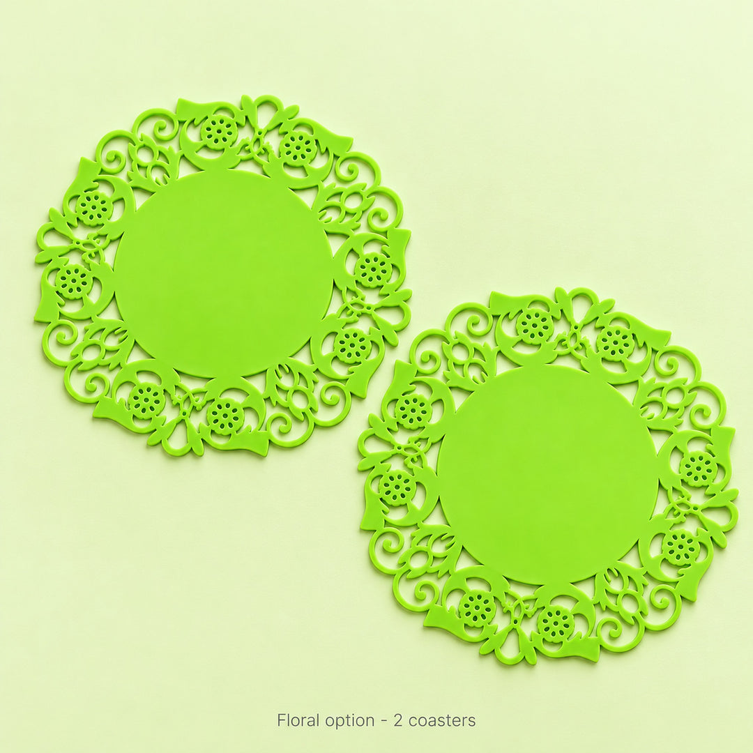 Two lime-green floral round coasters, sold as a pair.