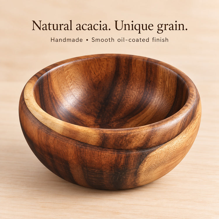 Handmade acacia bowl with unique wood grain and smooth oil-coated finish.