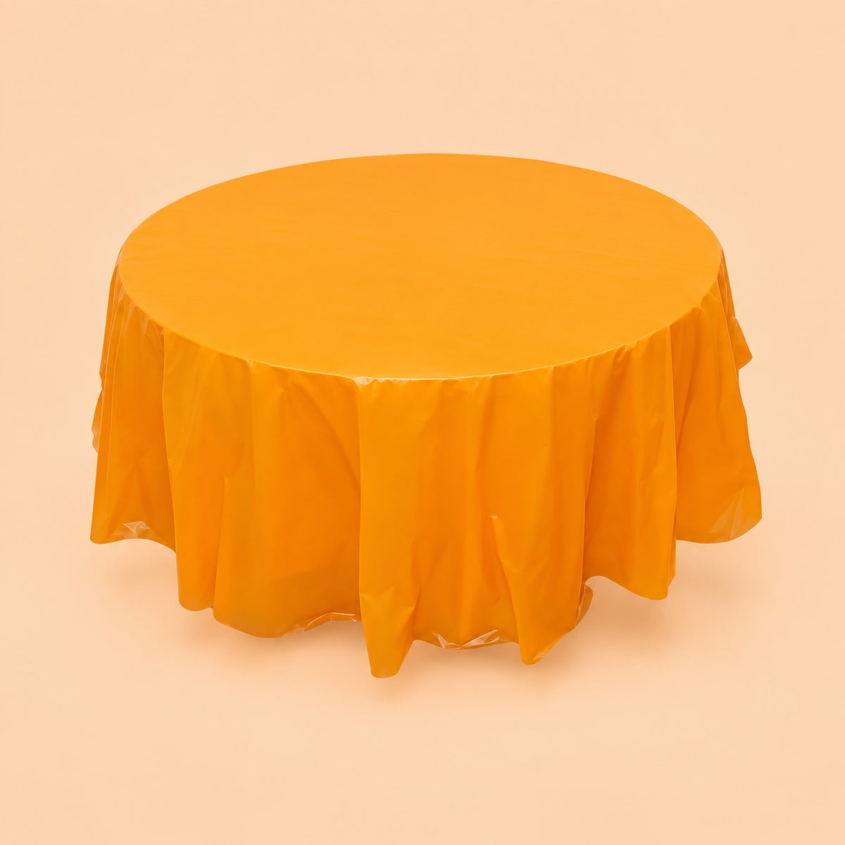 One orange disposable PVC tablecloth draped over a round table.