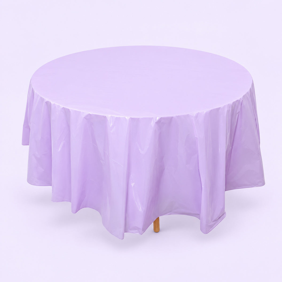 One lavender disposable PVC tablecloth draped over a round table.