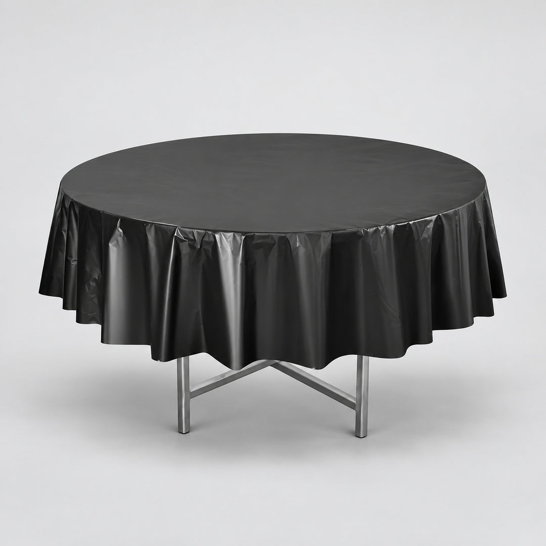 One black disposable PVC tablecloth draped over a round table.