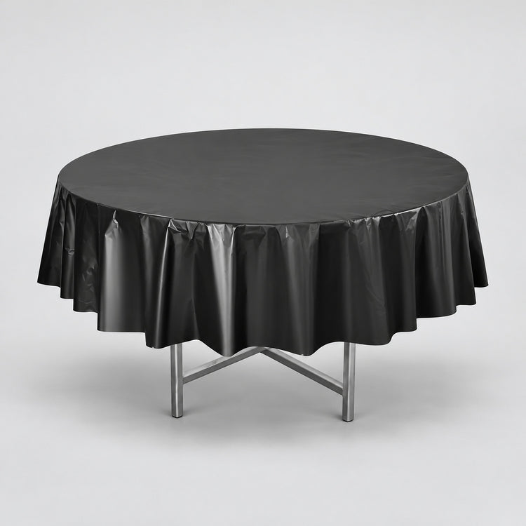 One black disposable PVC tablecloth draped over a round table.
