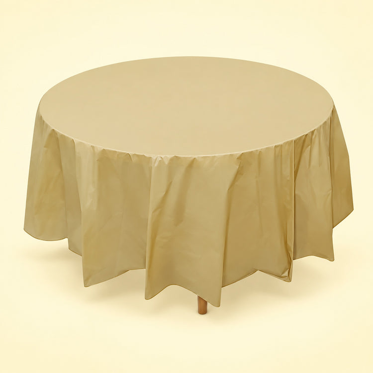 One gold disposable PVC tablecloth draped over a round table.