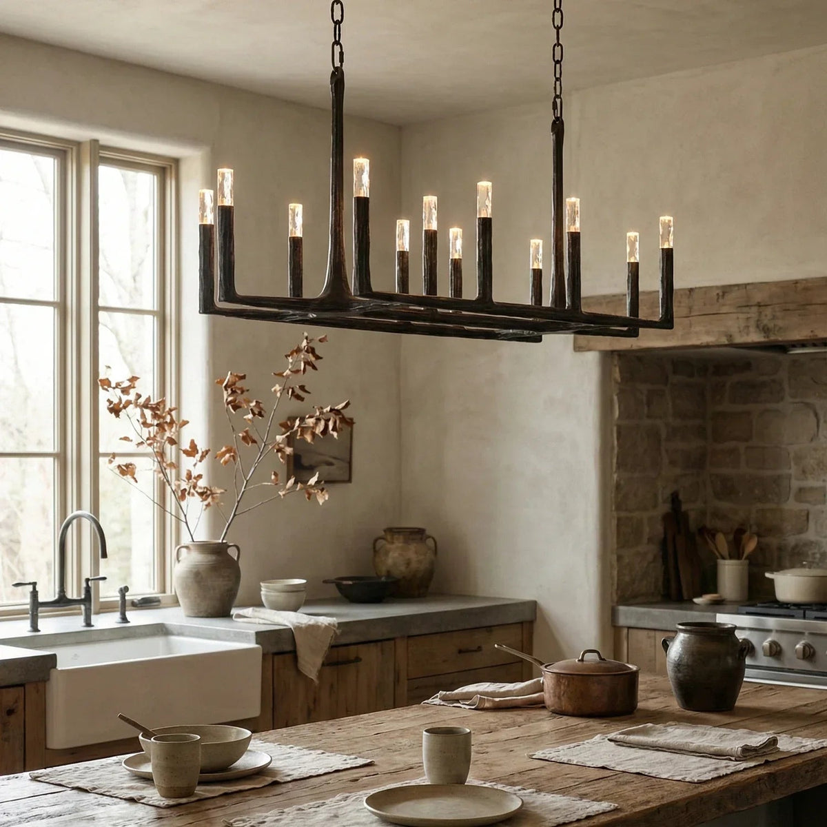 Kitchen with a large chandelier, wooden table, and rustic decor.