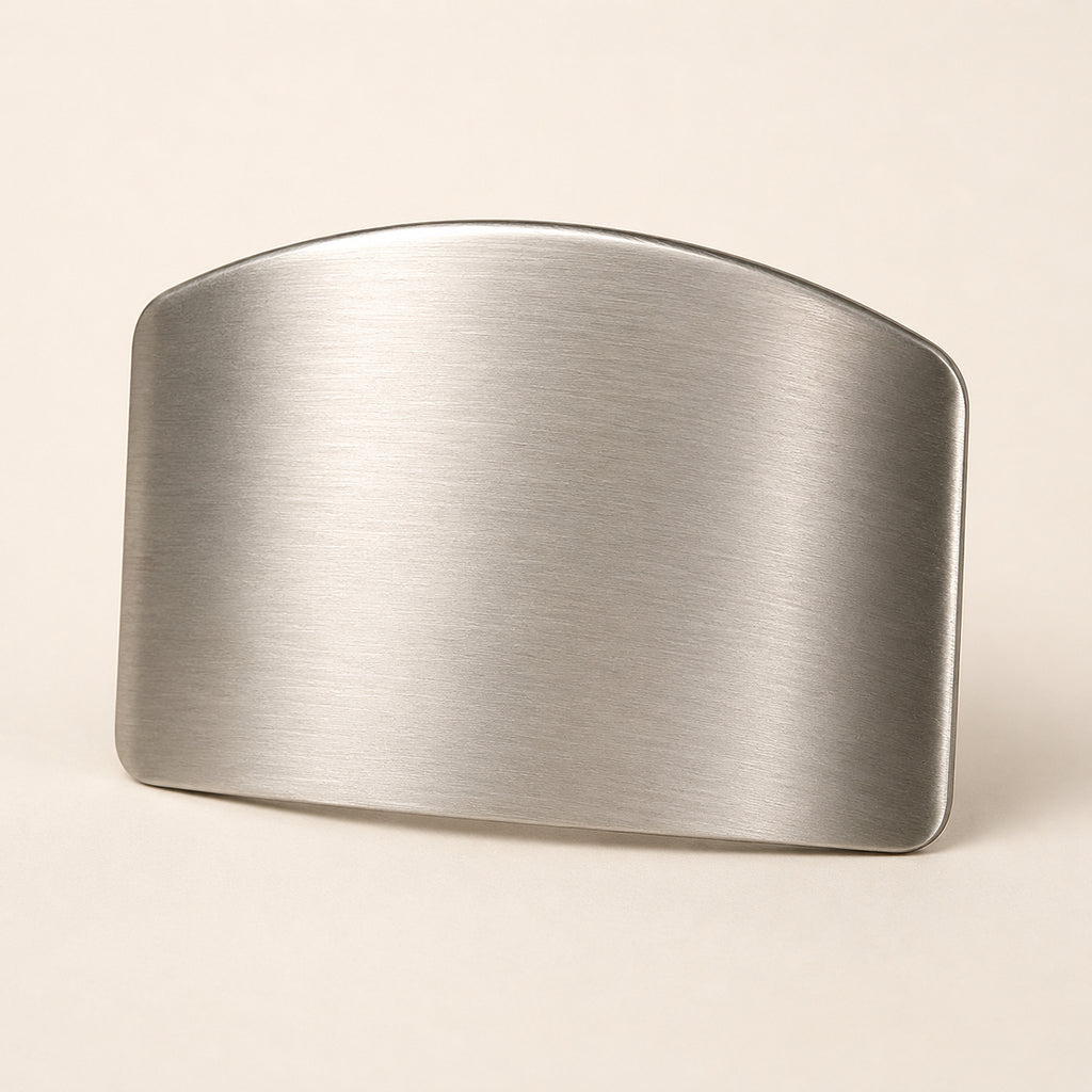 Stainless steel finger guard on a plain background, showing the brushed curved hood and rounded edge