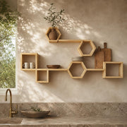 Eight-piece modular pine shelf set above a kitchen sink with plates and boards