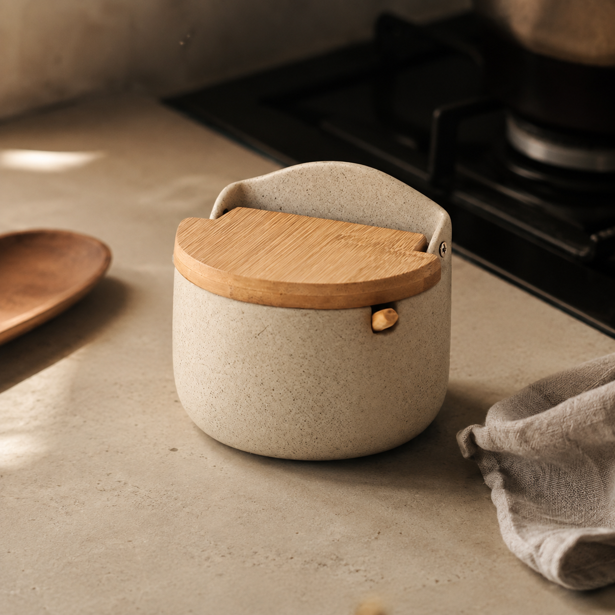 Ceramic salt cellar styled on a kitchen counter