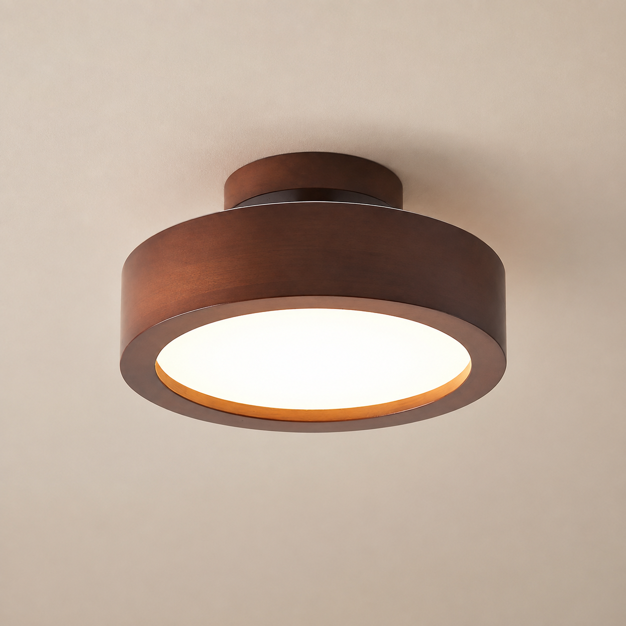 Wood flush mount ceiling light, straight-on shot on plain ceiling